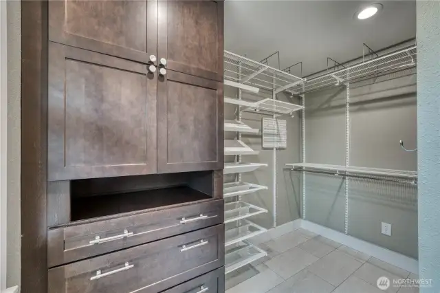 Fully updated primary bath with radiant floor heating and attached walk-in closet
