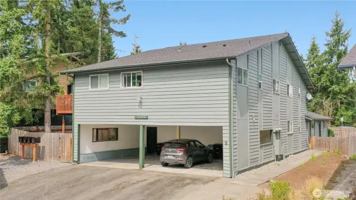 Tandem parking for two vehicles, carport and uncivered.