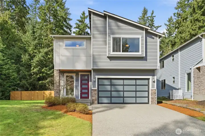 Exterior of this modern home with strong PNW design roots, set on an exceptionally large corner lot. Freshly painted and very clean, this home is ready for its new owners