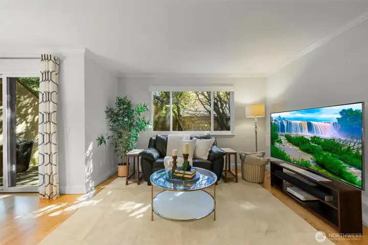 Patio doors lead to private backyard