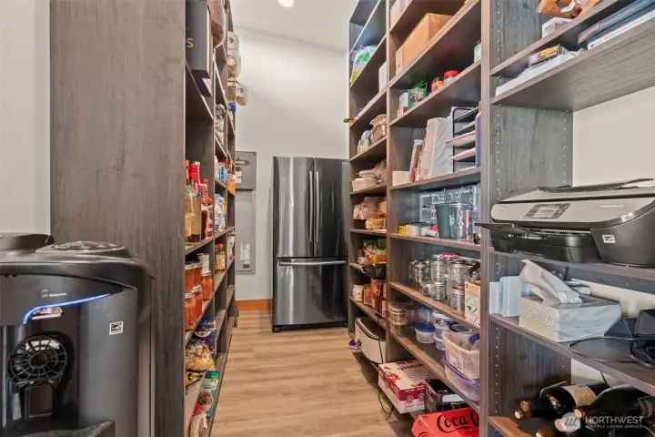 Walk-in pantry with room for an additional refer.