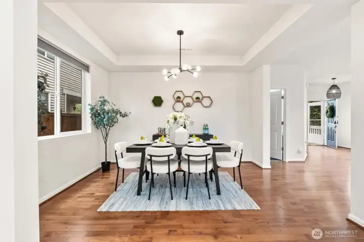 clean lines and coffered ceiling architecture really stands out in the dining room and throughout the home.