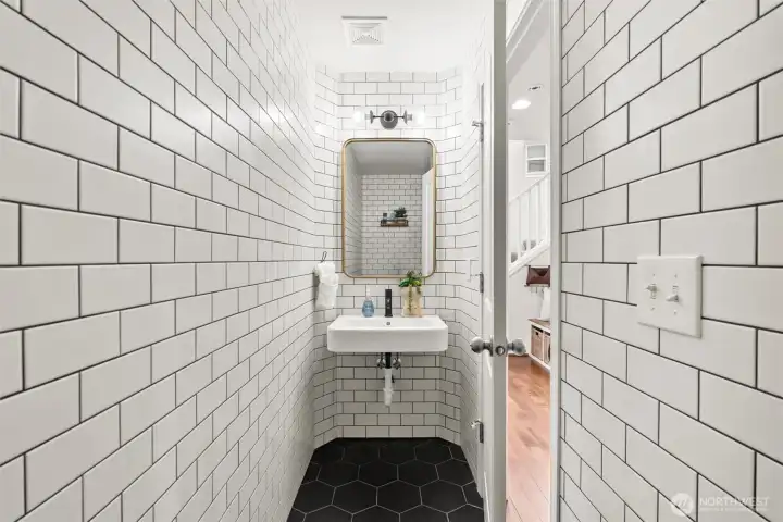 Upgraded 1/2 bath downstairs is an elegant surprise.