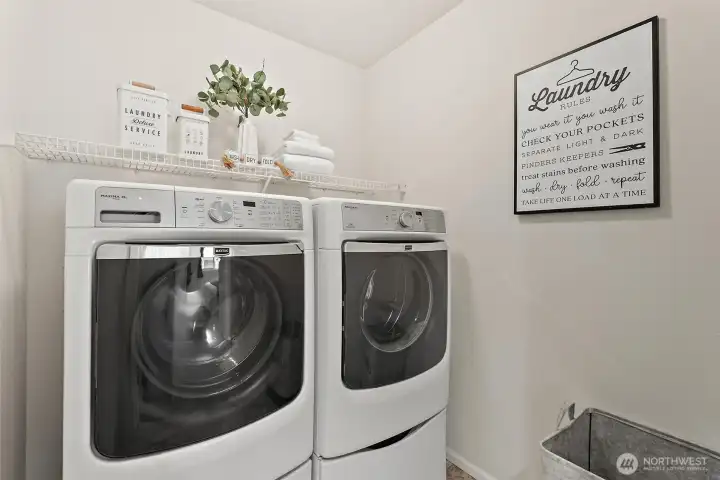 Laundry center conveniently located upstairs and appliances stay.