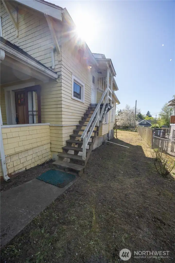 Want to use the second story as a duplex or just want more privacy?  Exterior staircase leads to upper floor/unit.