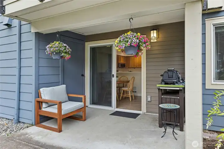Another view from the covered patio to the dining room and kitchen.