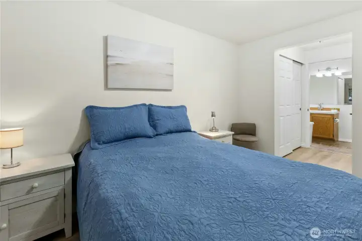 View from the primary bedroom to the private bath. Note: this primary suite has 2 large reach-in closets.