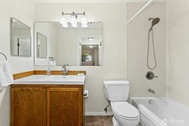 The primary bath has a brand new countertop/sink.