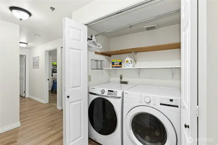 Full size, front-loading washer and dryer are included in the sale.