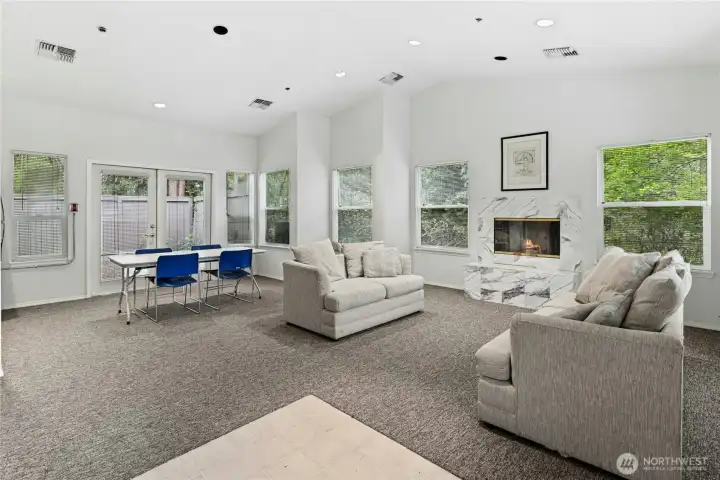 Spacious cabana with fireplace has plenty of windows to bring in natural light.