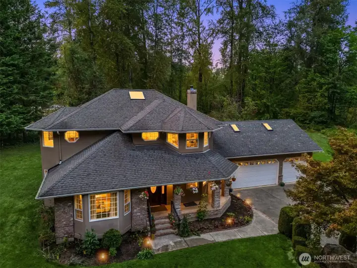 Welcome to this 6.84 Acre Woodinville Estate with singular privacy and serenity!
