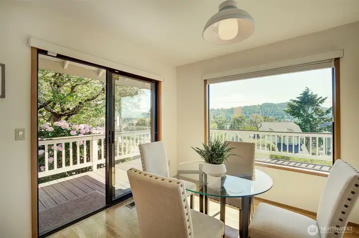 Kitchen eating area with slider to the deck.