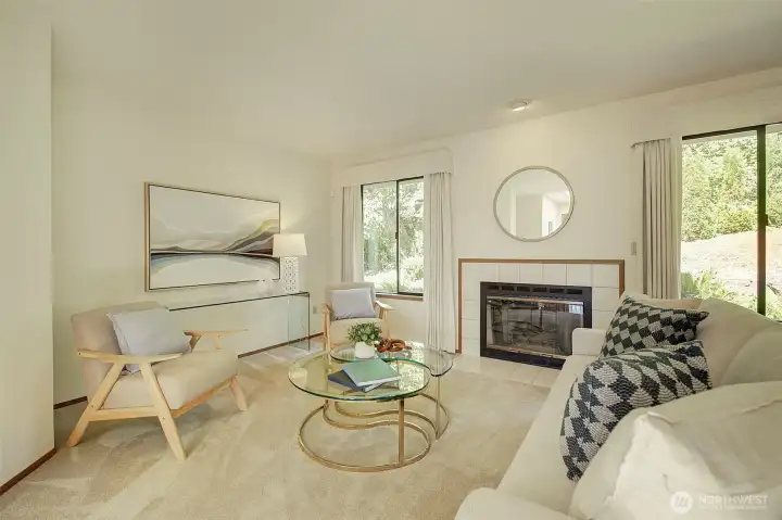 The gas fireplace anchors the living room.