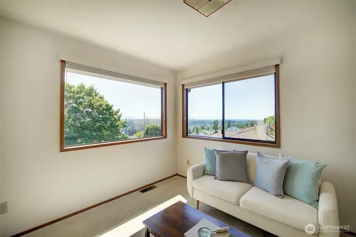 The sitting area in the primary was originally designed as a home office - with views, of course.