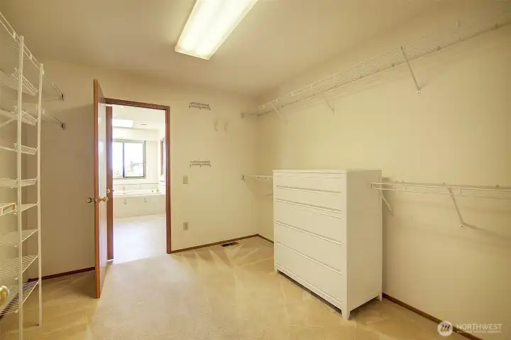 Large pass-through primary closet.