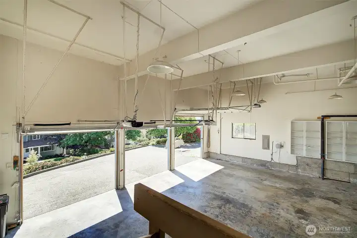 Huge three bay garage with one over-sized door.