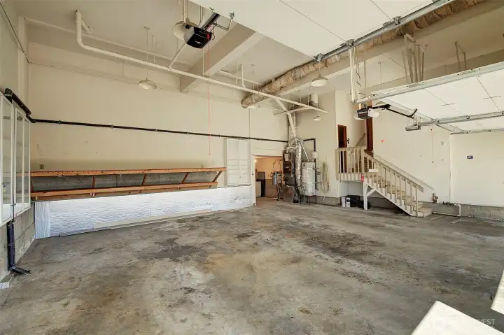 High ceilings and lots of room (with a shop area at the back) make this garage unique.