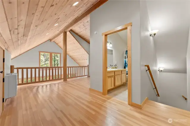 Upstairs loft area with full bathroom