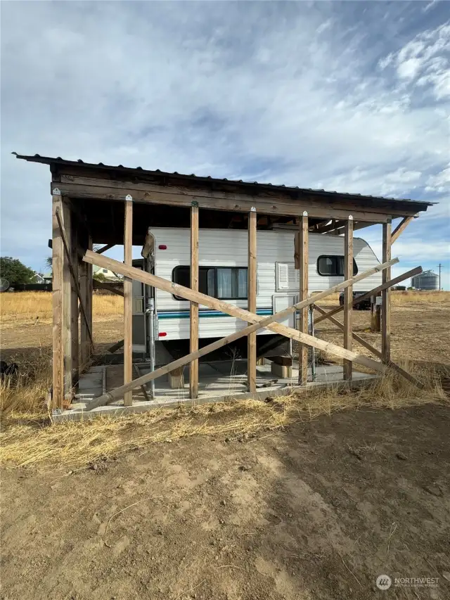 Camper stays, property has full RV hook-ups!