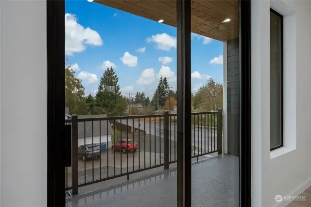 Large covered balcony to enjoy the neighborhood sounds with your morning coffee.