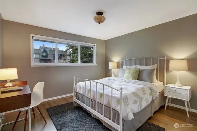 Second bedroom has custom closet built-ins.