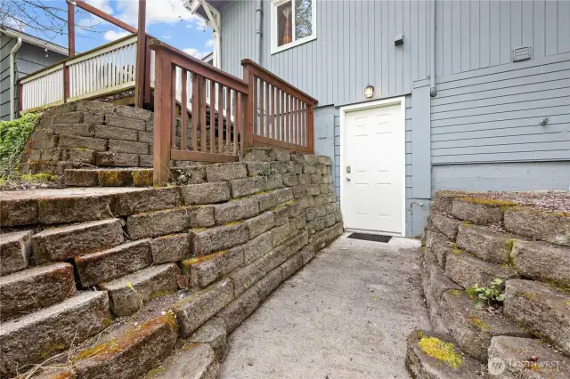 Stairs from back patio to downstairs entrance