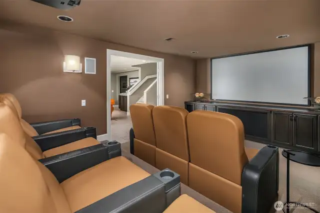7 seat acoustically engineered media room with 110' screen and Definitive Audio designed sound.