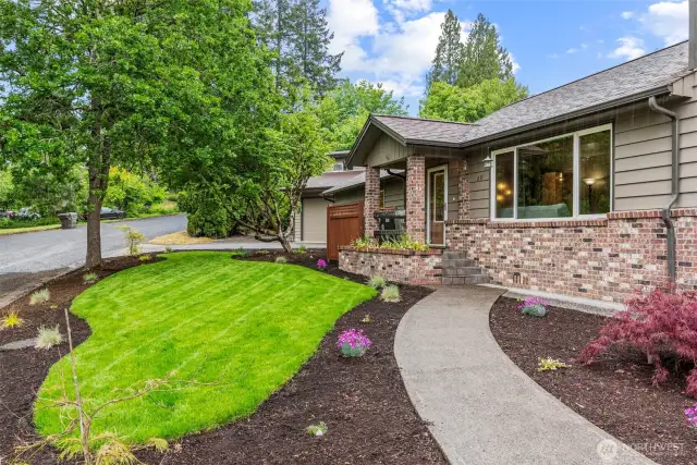 Beautiful yard and concrete work, front brick work, newer vinyl windows, furnace & heat pump.