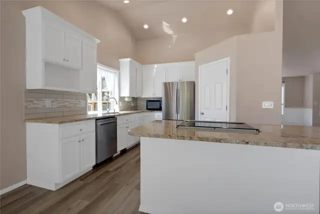 All new six panel doors throughout, recessed lighting, vaulted ceiling.