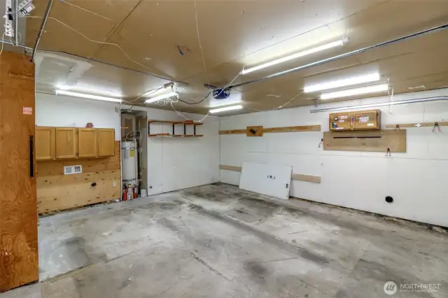 Garage fits 2 cars and still has extra space!
