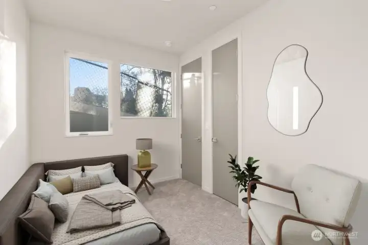 Main floor ADU Bedroom/office. Virtually staged-pic is of similar unit