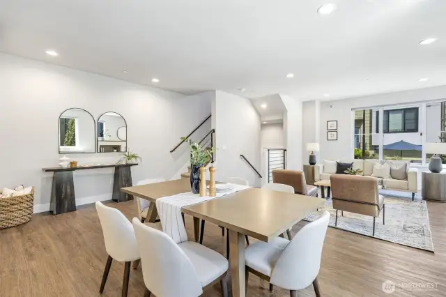 Dining area is roomy enough for a table for ten, all set for festive gatherings, Sunday brunches, or game night with friends