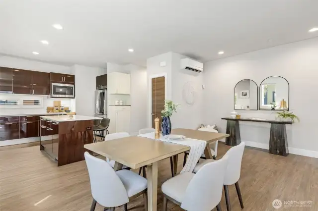 Main level includes a coat closet and walk-in pantry, providing accessible storage and everyday convenience.  Magnetic door stops throughout the home