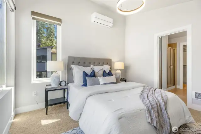 Cordless Hunter Douglas blinds grace each window with sleek sophistication