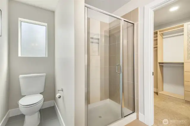 Walk-in shower with built-in shelves