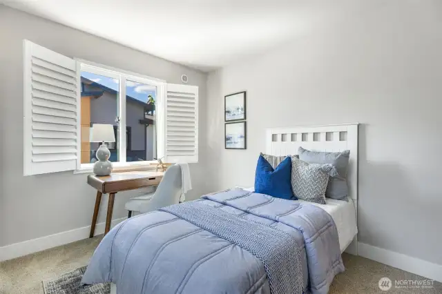 Bedroom two also has a closet with sliding doors & California Closet organizers