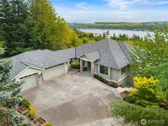A rare offering...3680sf of soaring spaces! Every room is large, and oversized windows provide tons of natural light. The oversized 3-car garage has shop space on one side, with plenty of room leftover for your toys!