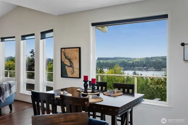 From the living area, the sunny eating area is designed to take in the views all day long.