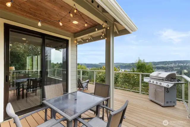Outside the kitchen, this covered eating area is perfect for morning sunrises and warm evenings admiring the view.
