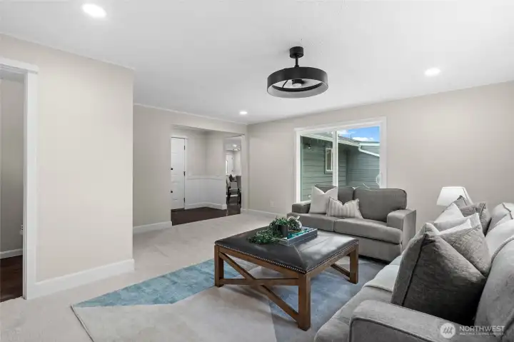 This room offers convenient access to the powder room, laundry room, and garage.