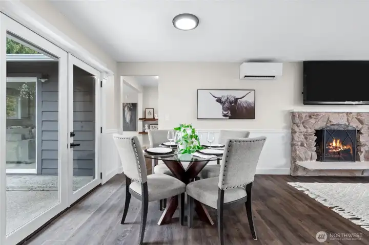 rench doors in the cozy dining area frame views of the private backyard, enhancing natural light and blending indoor comfort with outdoor beauty