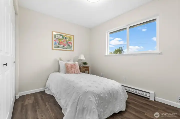 Each room includes a built-in closet, a window for natural light, and hard surface flooring—an ideal choice for those with allergy sensitivities.