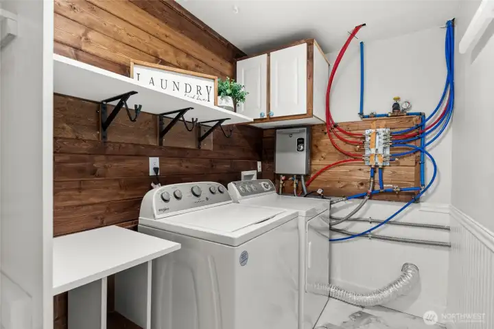 The laundry room is conveniently located inside the home off the family room.  The washer and dryer convey with the home.