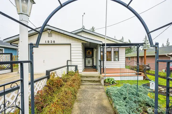 Extended living space with a water-facing side deck and a high-end metal covered awning, usable year-round.
