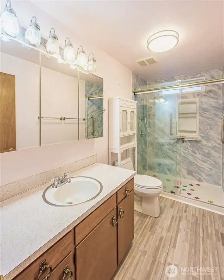 Bathroom with a remodeled shower.