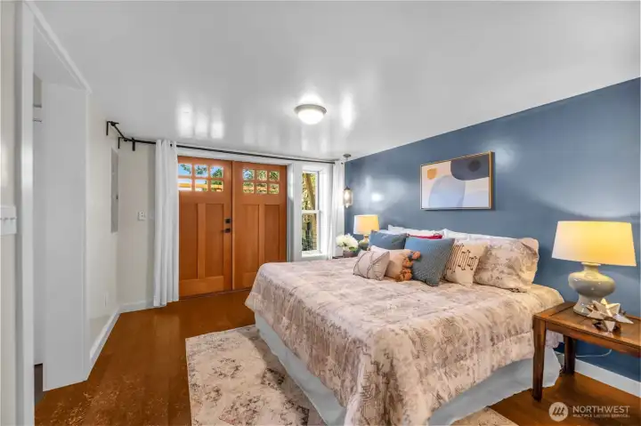 French doors lead to private deck area