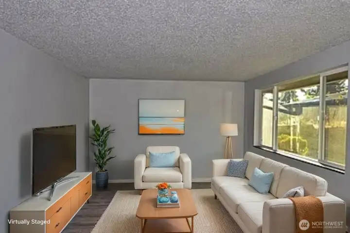 Great floor plan with kitchen open to living room. (Virtually staged)