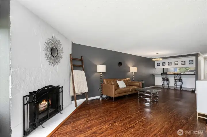 Cozy fireplace serves as a focal point, adding warmth and ambiance during cooler months.