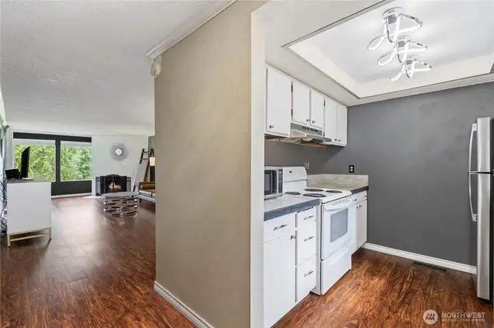 Kitchen is conveniently positioned adjacent to the dining and living areas for easy everyday living.
