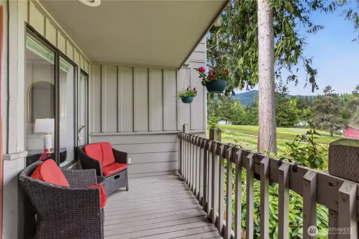 Enjoy front-row views of the fairway from the comfort of your living room or primary suite and private covered deck.